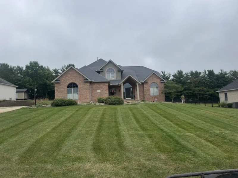 Freshly mowed and striped front lawn at a home in Stark County, Ohio